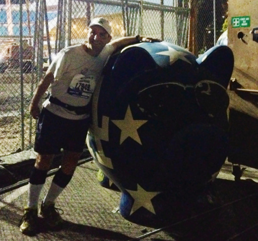 Me at the LA Marathon next to a Dodgers pig